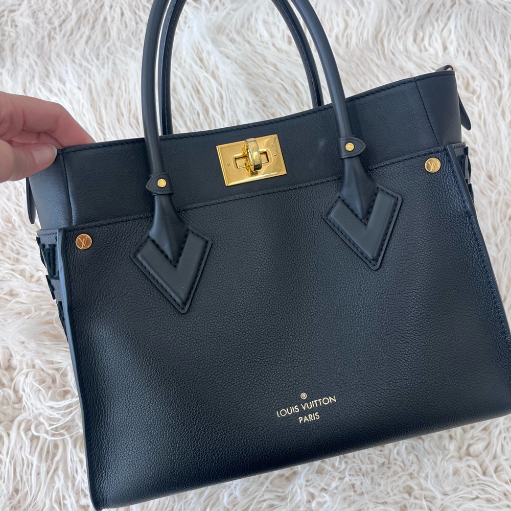 Louis Vuitton monogram tufting on side bag